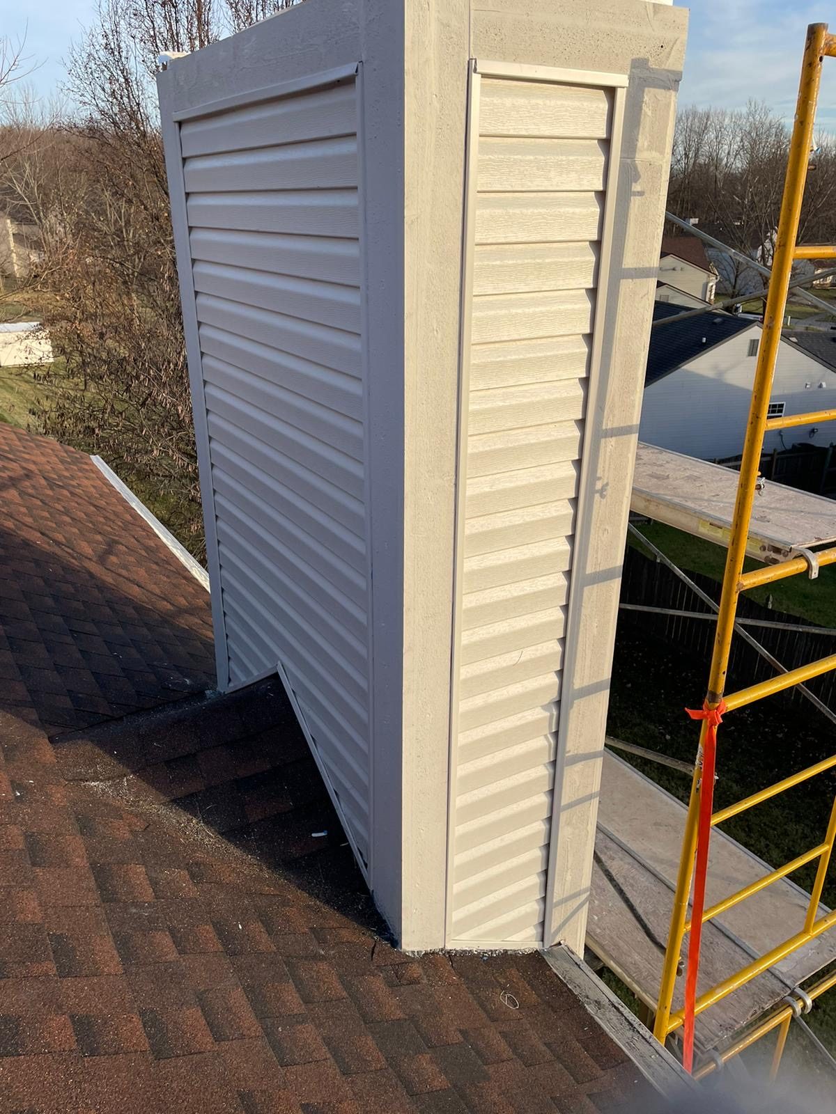 Chimney chase restoration on a residential roof in Indianapolis, IN