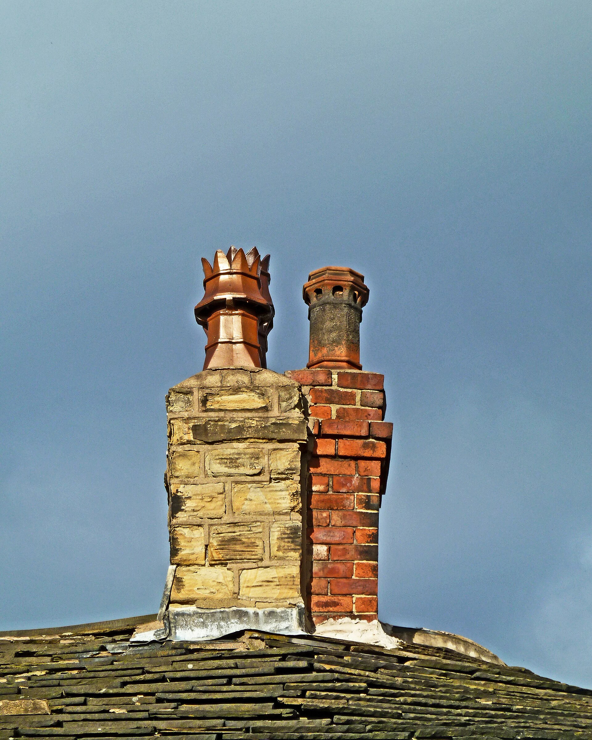 Brick and stone chimney construction by masonry contractor Indianapolis, IN